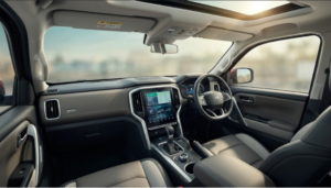 High-tech cabin interior of the Mahindra Scorpio Lifestyler showing a portrait touchscreen, digital instrument cluster, and premium seating.